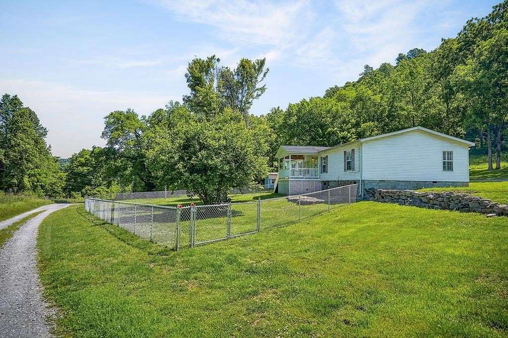 164 Acres of Agricultural Land with Home for Sale in Buffalo Valley, Tennessee