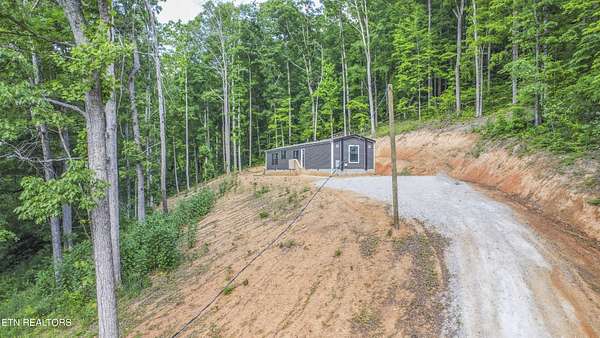 3.44 Acres of Land with Home for Sale in Philadelphia, Tennessee