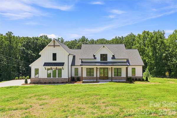 11.6 Acres of Land with Home for Sale in Midland, North Carolina
