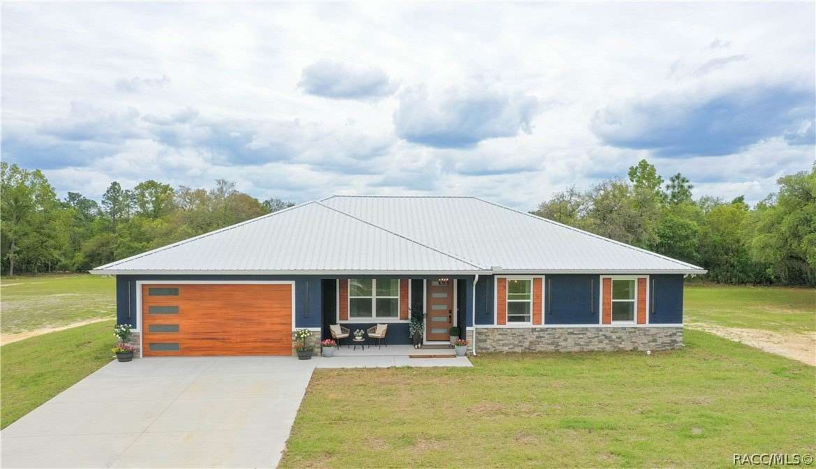 7.77 Acres of Land with Home for Sale in Dunnellon, Florida