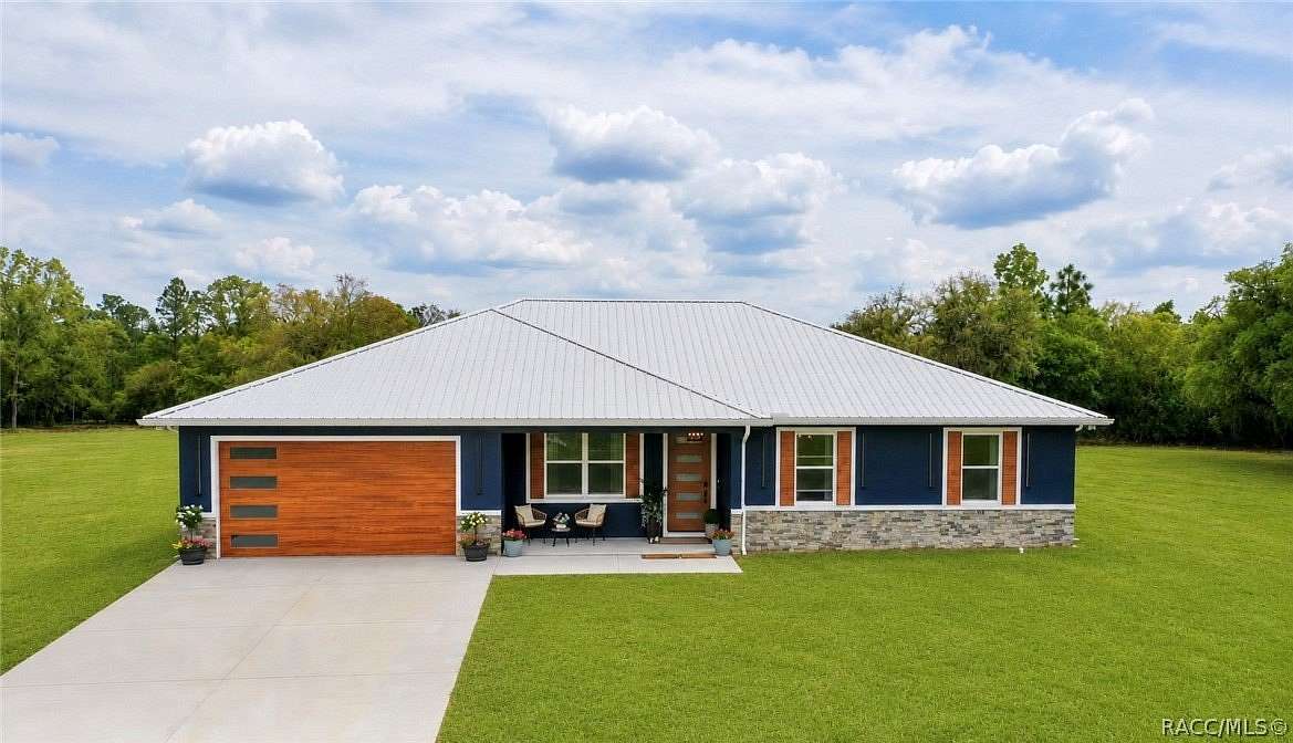 7.77 Acres of Land with Home for Sale in Dunnellon, Florida