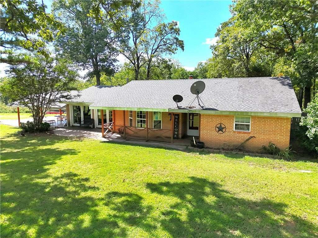 8 Acres of Land with Home for Sale in Bunch, Oklahoma