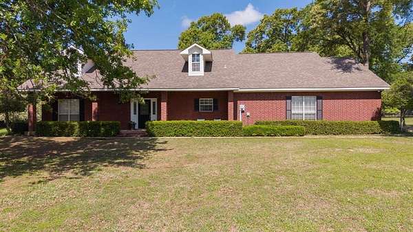 5.7 Acres of Land with Home for Sale in Yantis, Texas