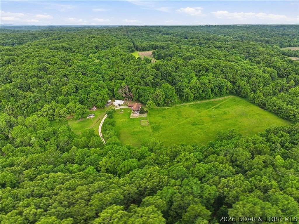 20.2 Acres of Land with Home for Sale in Gravois Mills, Missouri