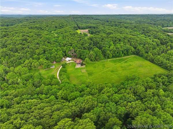 20.2 Acres of Land with Home for Sale in Gravois Mills, Missouri