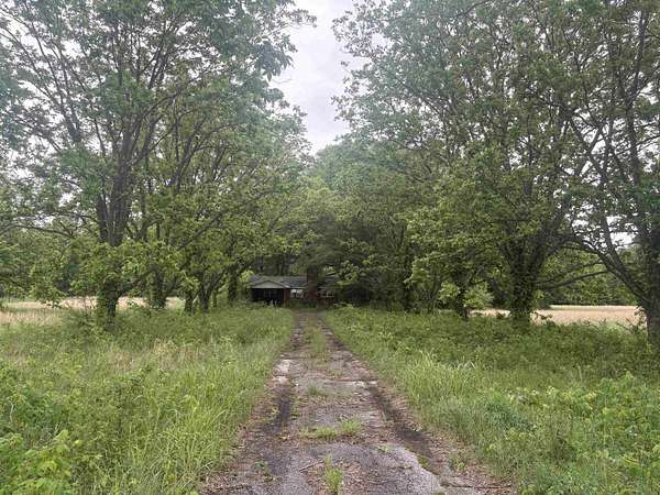 7 Acres of Land with Home for Sale in Covington, Tennessee
