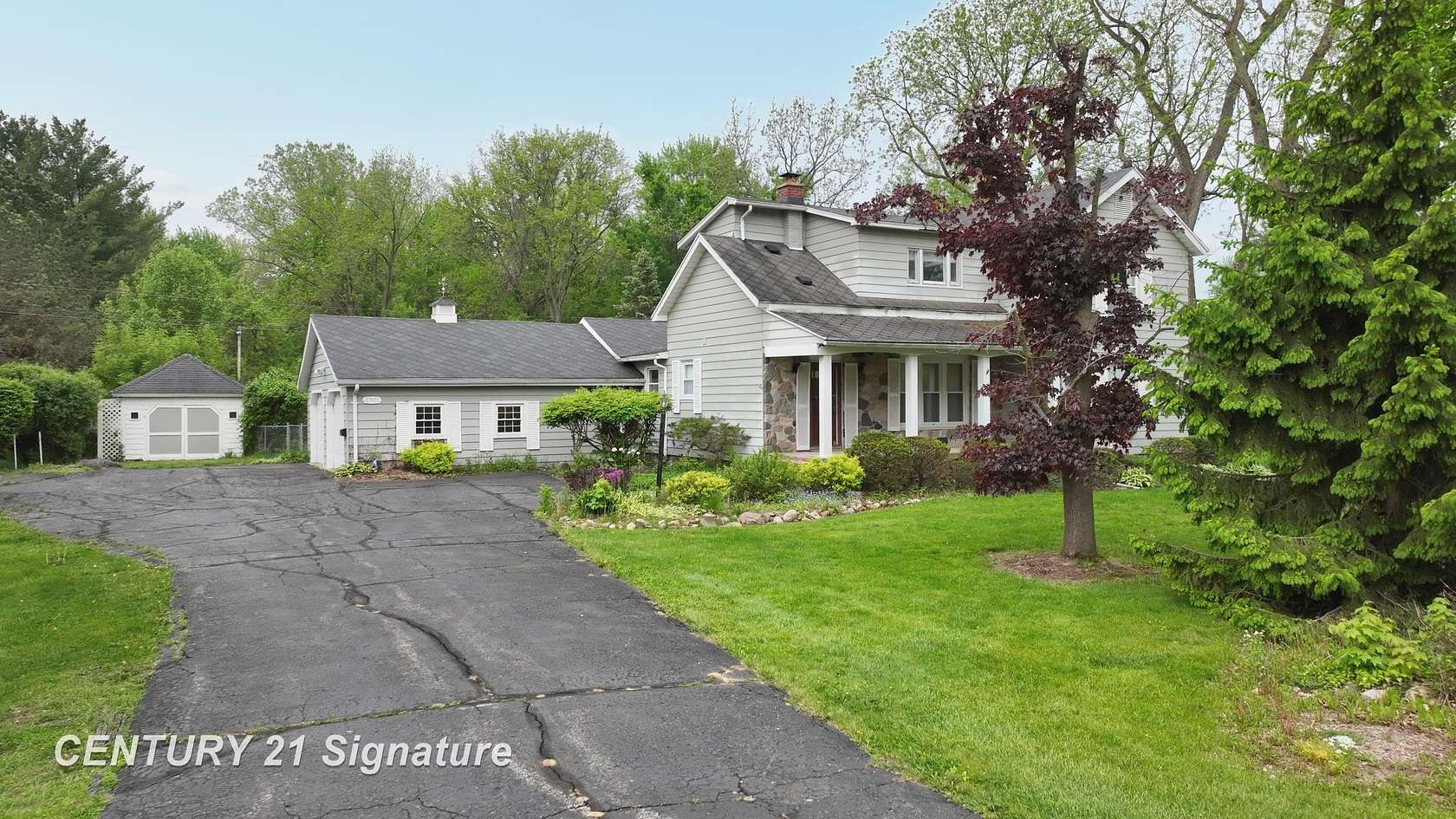 7.9 Acres of Land with Home for Sale in Flint, Michigan