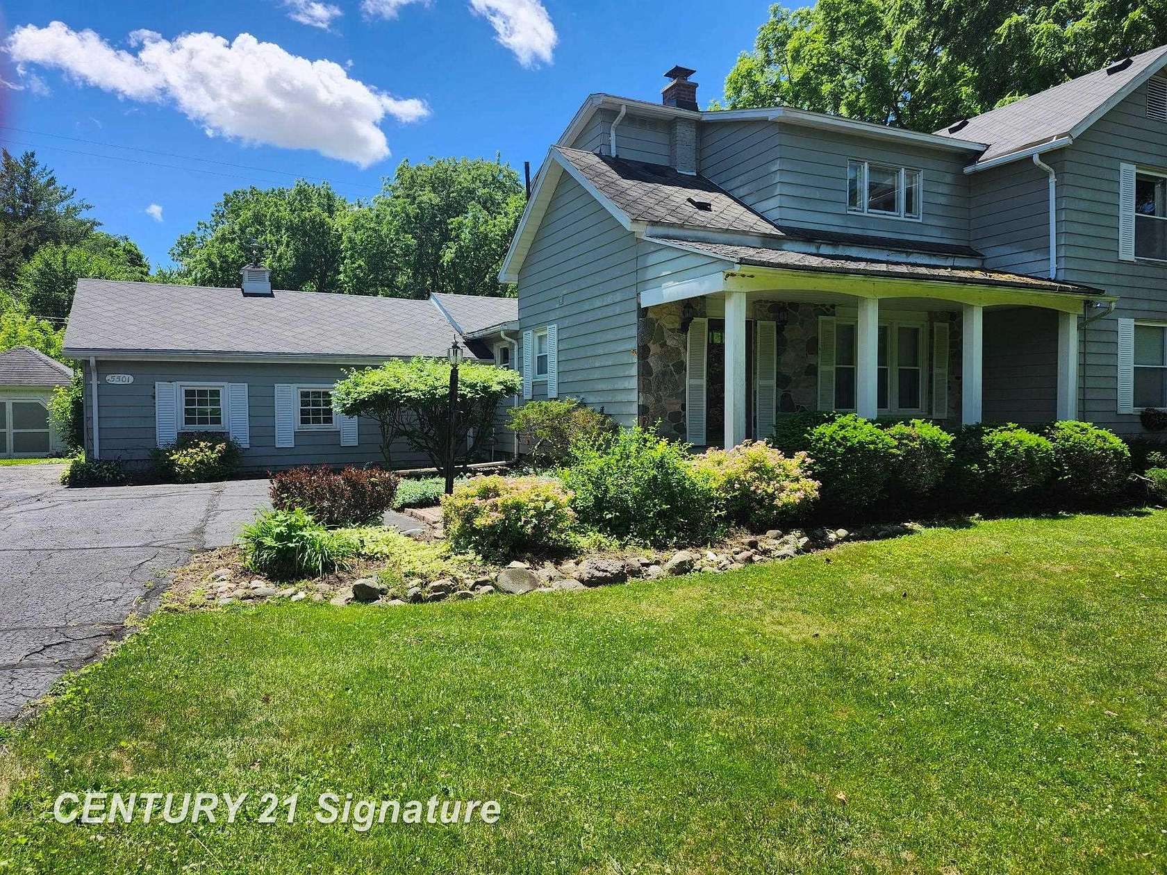 7.9 Acres of Land with Home for Sale in Flint, Michigan