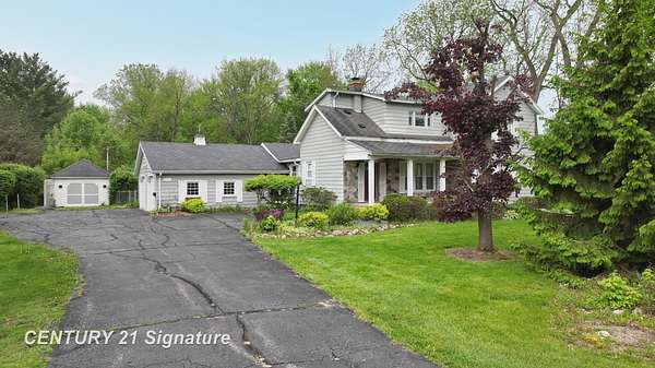 7.9 Acres of Land with Home for Sale in Flint, Michigan