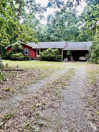6.65 Acres of Land with Home for Sale in Hohenwald, Tennessee