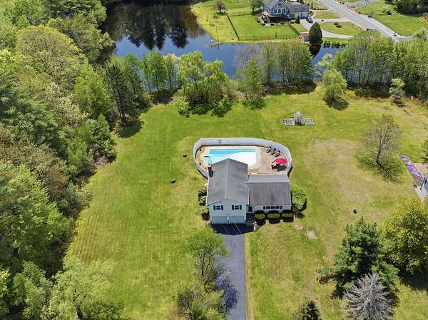 1.5 Acres of Land with Home for Sale in Bedford, New Hampshire