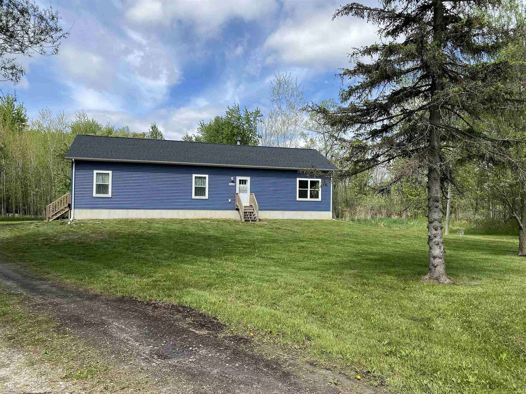 10 Acres of Recreational Land with Home for Sale in Emmett, Michigan