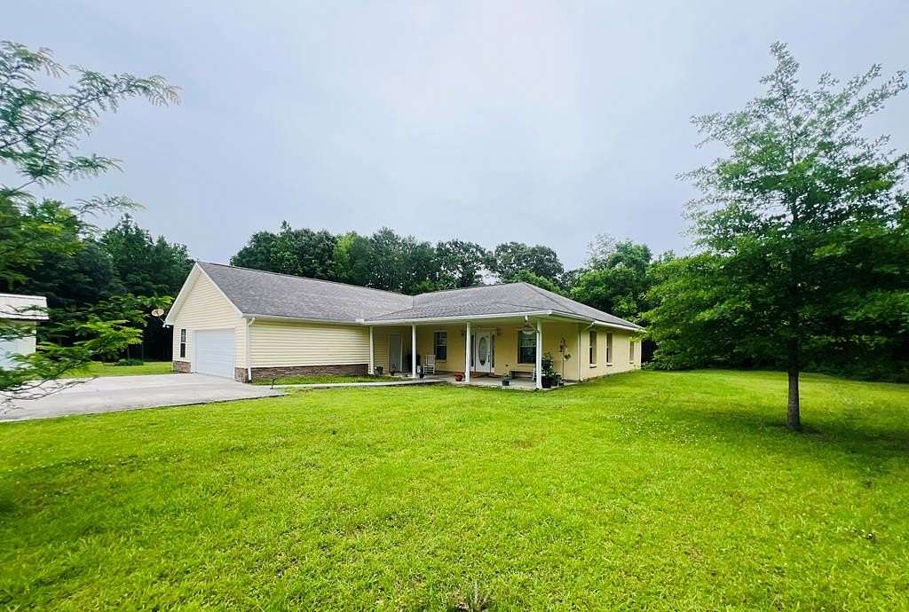 7.8 Acres of Land with Home for Sale in Carriere, Mississippi