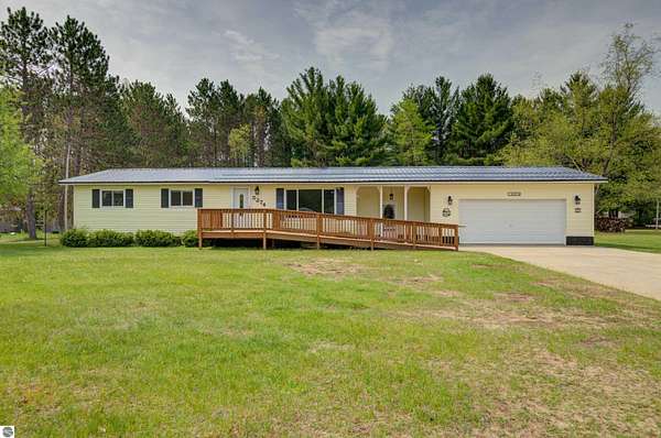 1.5 Acres of Land with Home for Sale in South Boardman, Michigan