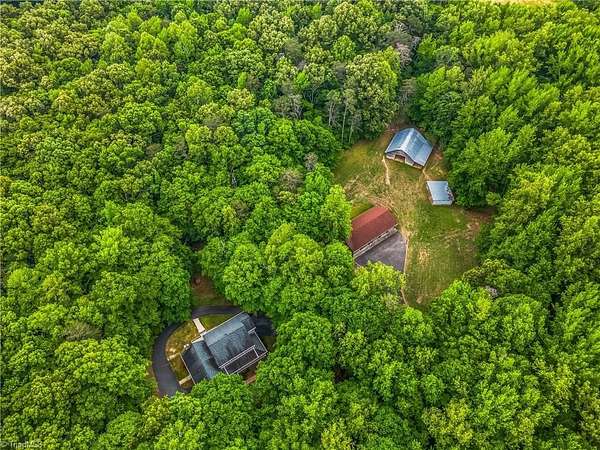 14 Acres of Land with Home for Sale in Lewisville, North Carolina
