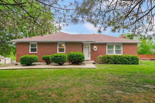 9.5 Acres of Land with Home for Sale in Lathrop, Missouri