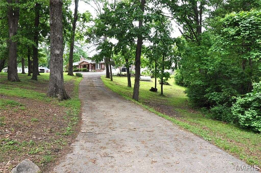 19 Acres of Land with Home for Sale in Arnold, Missouri