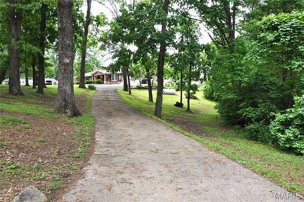 19 Acres of Land with Home for Sale in Arnold, Missouri