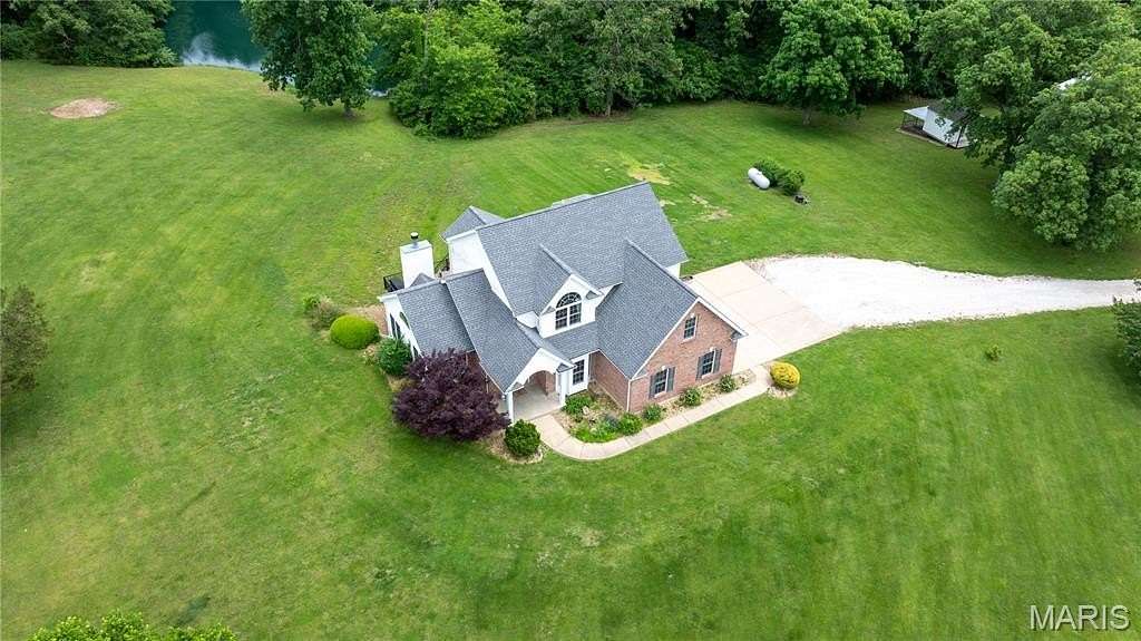 15 Acres of Recreational Land with Home for Sale in Troy, Missouri