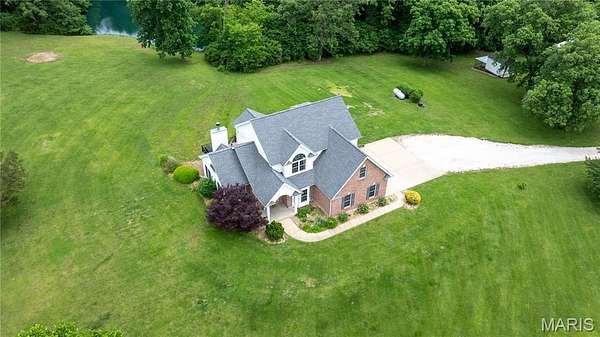 15 Acres of Recreational Land with Home for Sale in Troy, Missouri