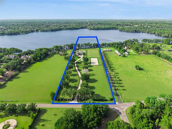 14.3 Acres of Land with Home for Sale in Oviedo, Florida