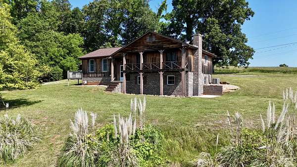 7.1 Acres of Land with Home for Sale in Dandridge, Tennessee