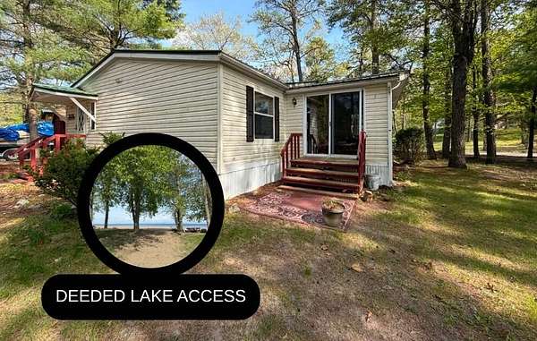 27 Acres of Land with Home for Sale in Peru, New York