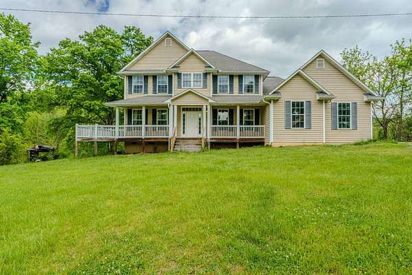 16.6 Acres of Recreational Land with Home for Sale in Johnson City, Tennessee