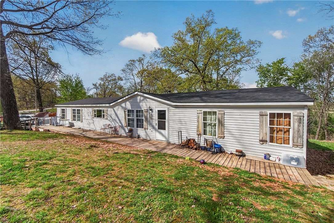 5.47 Acres of Land with Home for Sale in Rogers, Arkansas