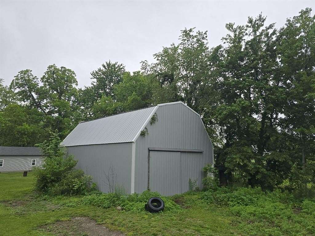Land with Home for Sale in Philpot, Kentucky