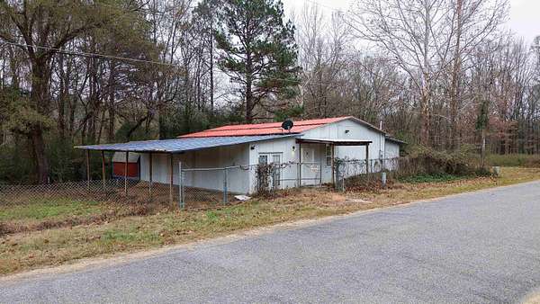 4.48 Acres of Land with Home for Sale in Sheridan, Arkansas