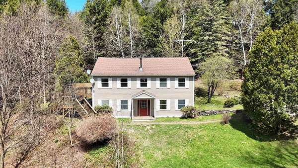 3.5 Acres of Land with Home for Sale in Stowe, Vermont