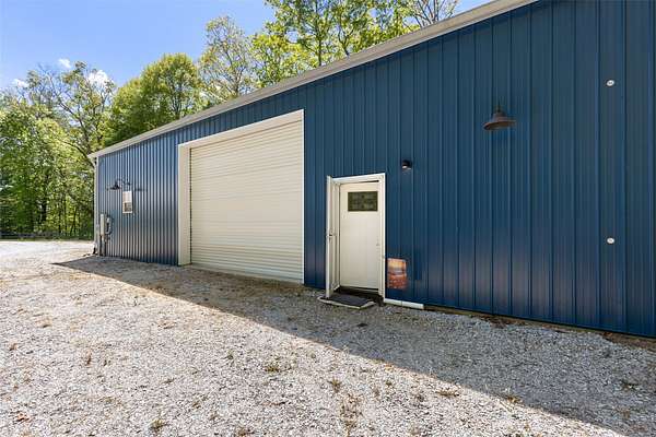 10.9 Acres of Recreational Land with Home for Sale in Scaly Mountain, North Carolina