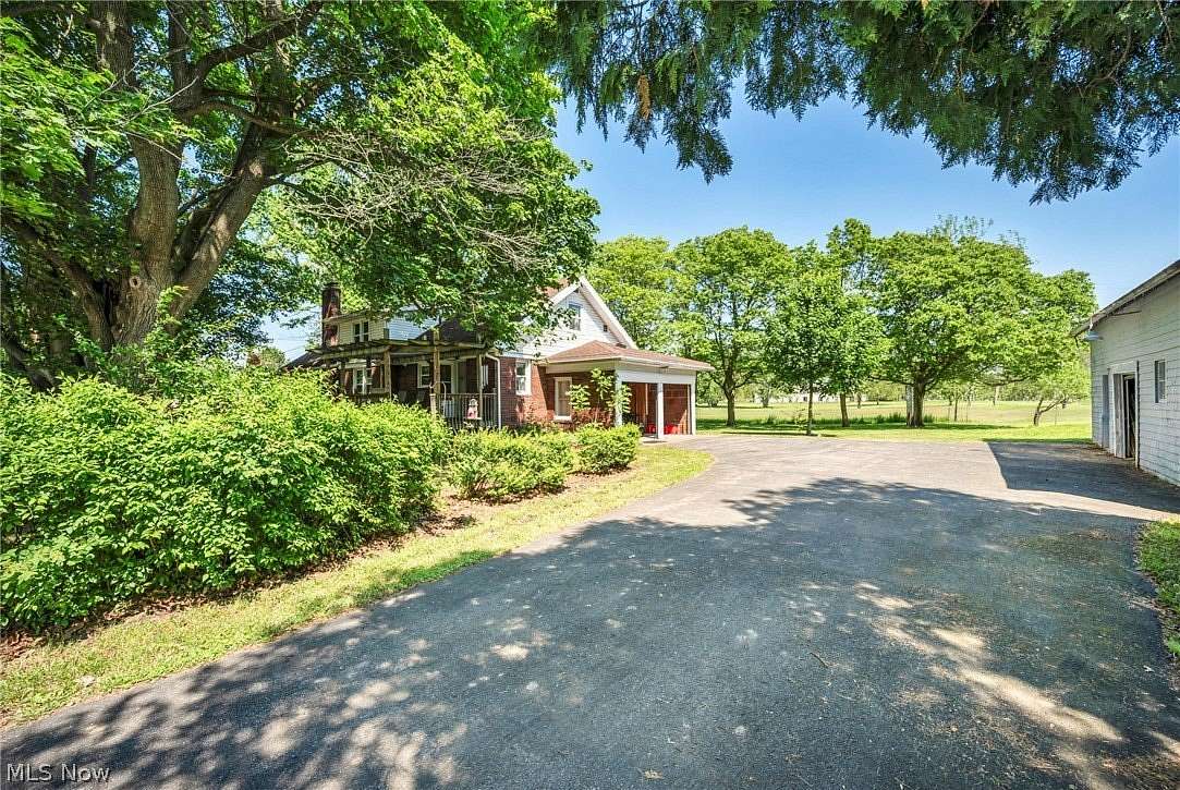 9.16 Acres of Land with Home for Sale in Uniontown, Ohio
