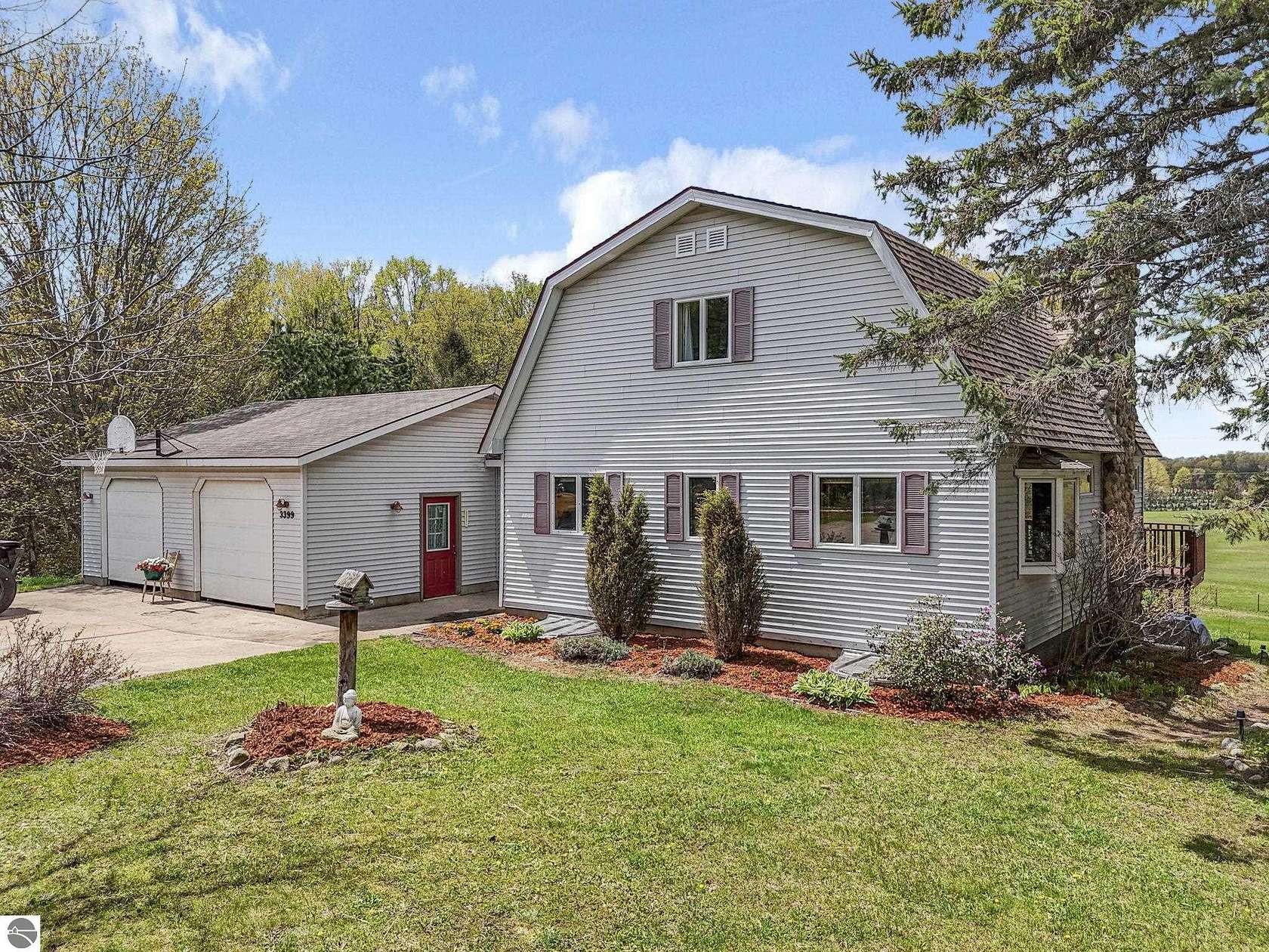 10 Acres of Land with Home for Sale in Manton, Michigan