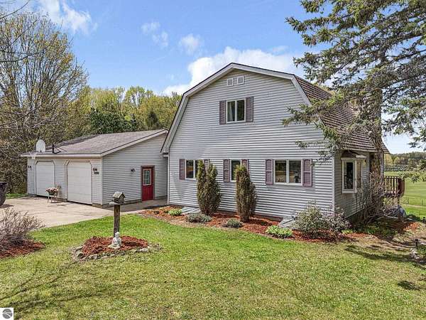 10 Acres of Land with Home for Sale in Manton, Michigan