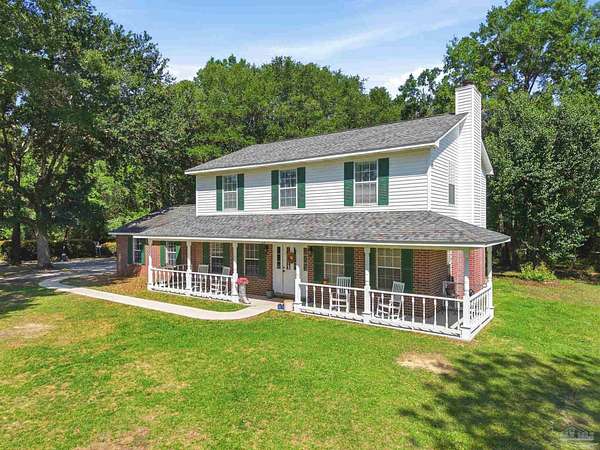 4.8 Acres of Land with Home for Sale in Milton, Florida