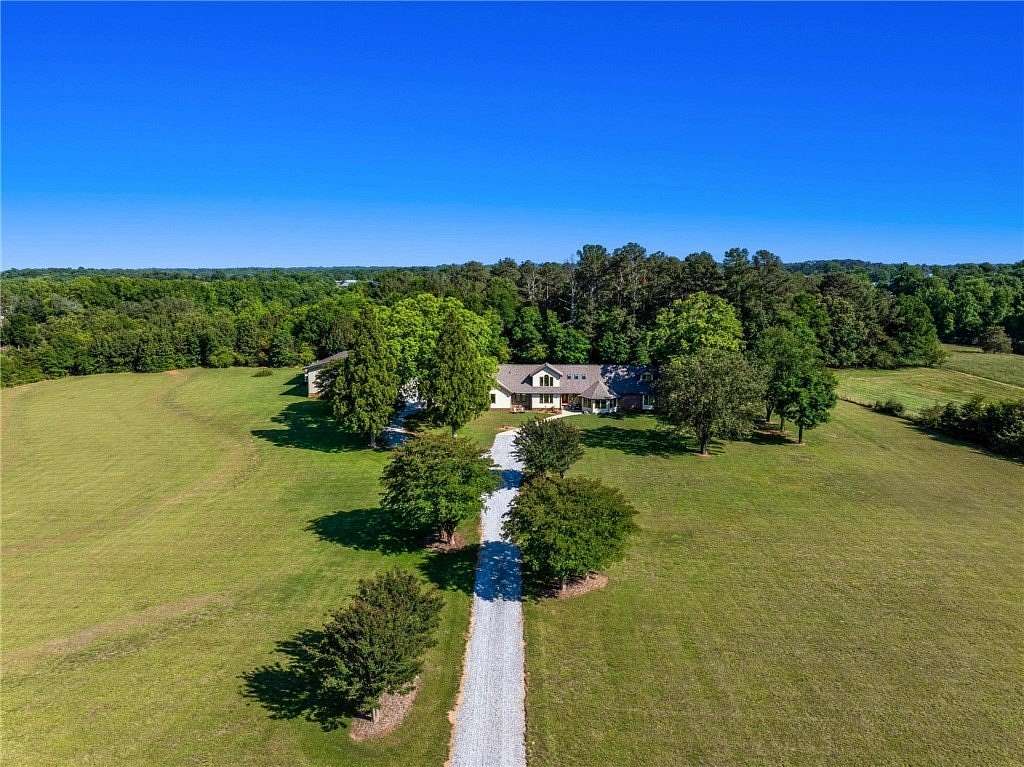 9.8 Acres of Land with Home for Sale in Seneca, South Carolina