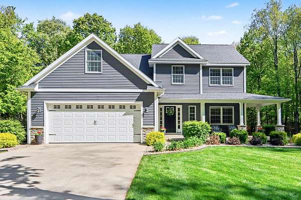12 Acres of Recreational Land with Home for Sale in Richland, Michigan