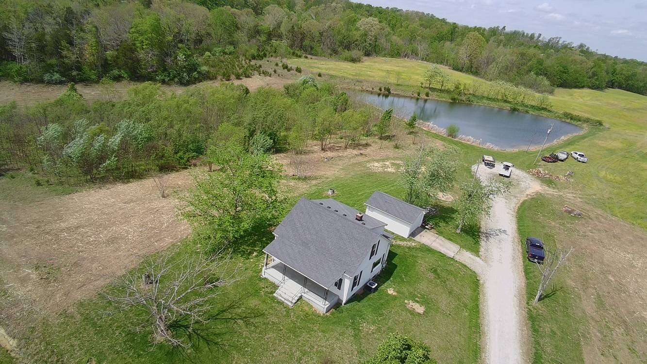 111 Acres of Land with Home for Auction in Loretto, Kentucky