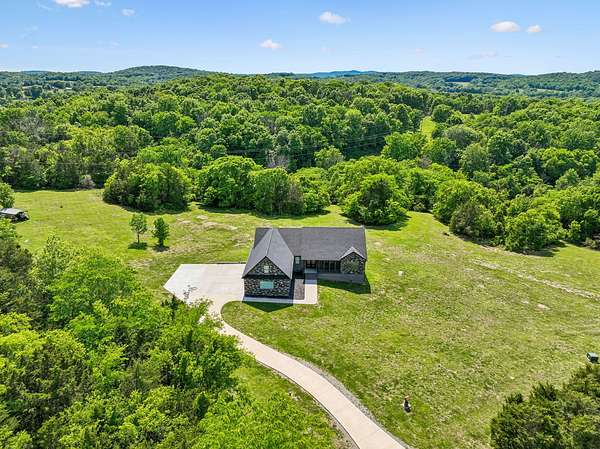 15 Acres of Land with Home for Sale in Watertown, Tennessee
