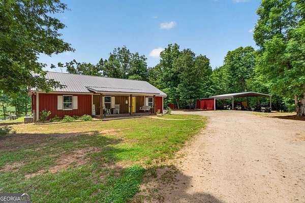 30 Acres of Recreational Land with Home for Sale in Milner, Georgia
