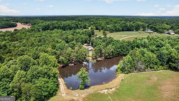 30 Acres of Recreational Land with Home for Sale in Milner, Georgia
