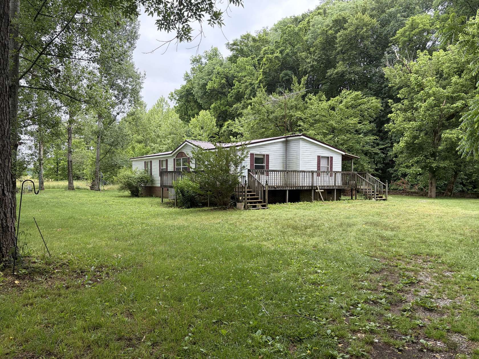 5.1 Acres of Land with Home for Sale in Cumberland Furnace, Tennessee