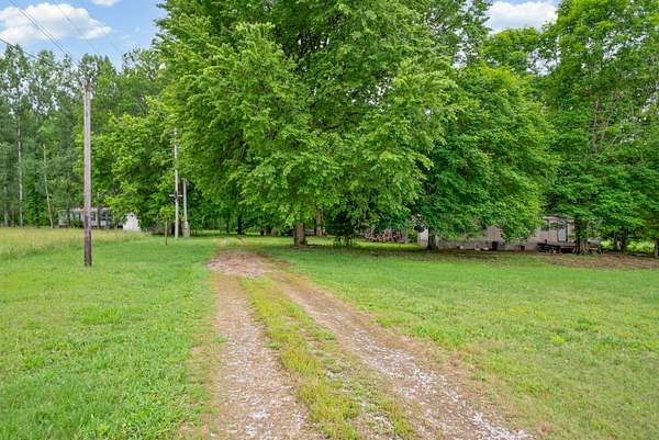 5.1 Acres of Land with Home for Sale in Cumberland Furnace, Tennessee