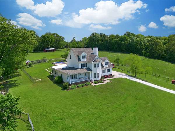 24.4 Acres of Agricultural Land with Home for Sale in Vanleer, Tennessee