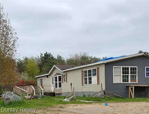 10 Acres of Recreational Land with Home for Sale in Worth Township, Michigan