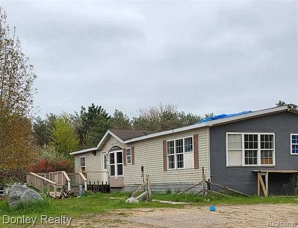 10 Acres of Recreational Land with Home for Sale in Worth Township, Michigan