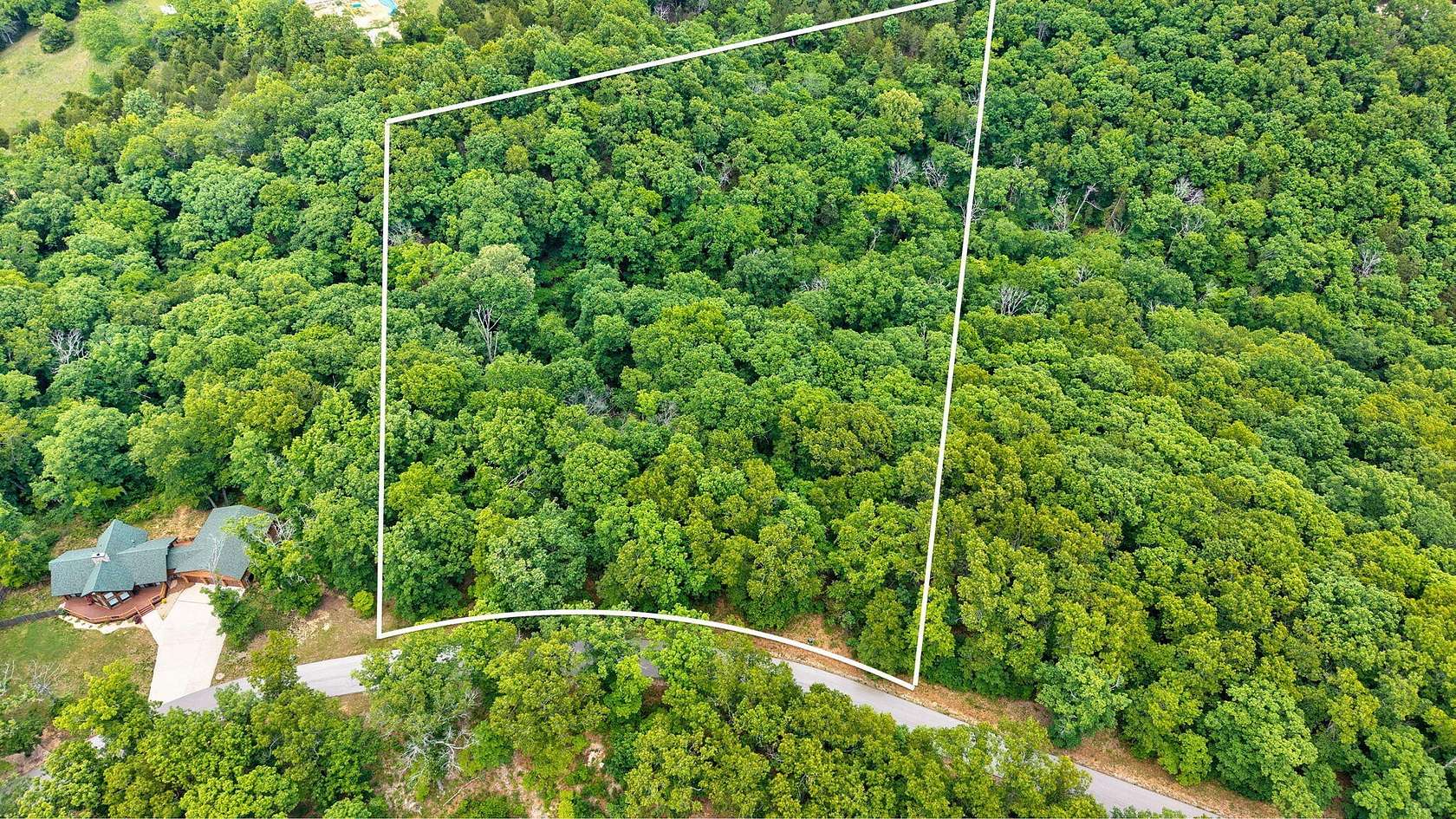 5 Acres of Residential Land for Sale in Saddlebrooke, Missouri