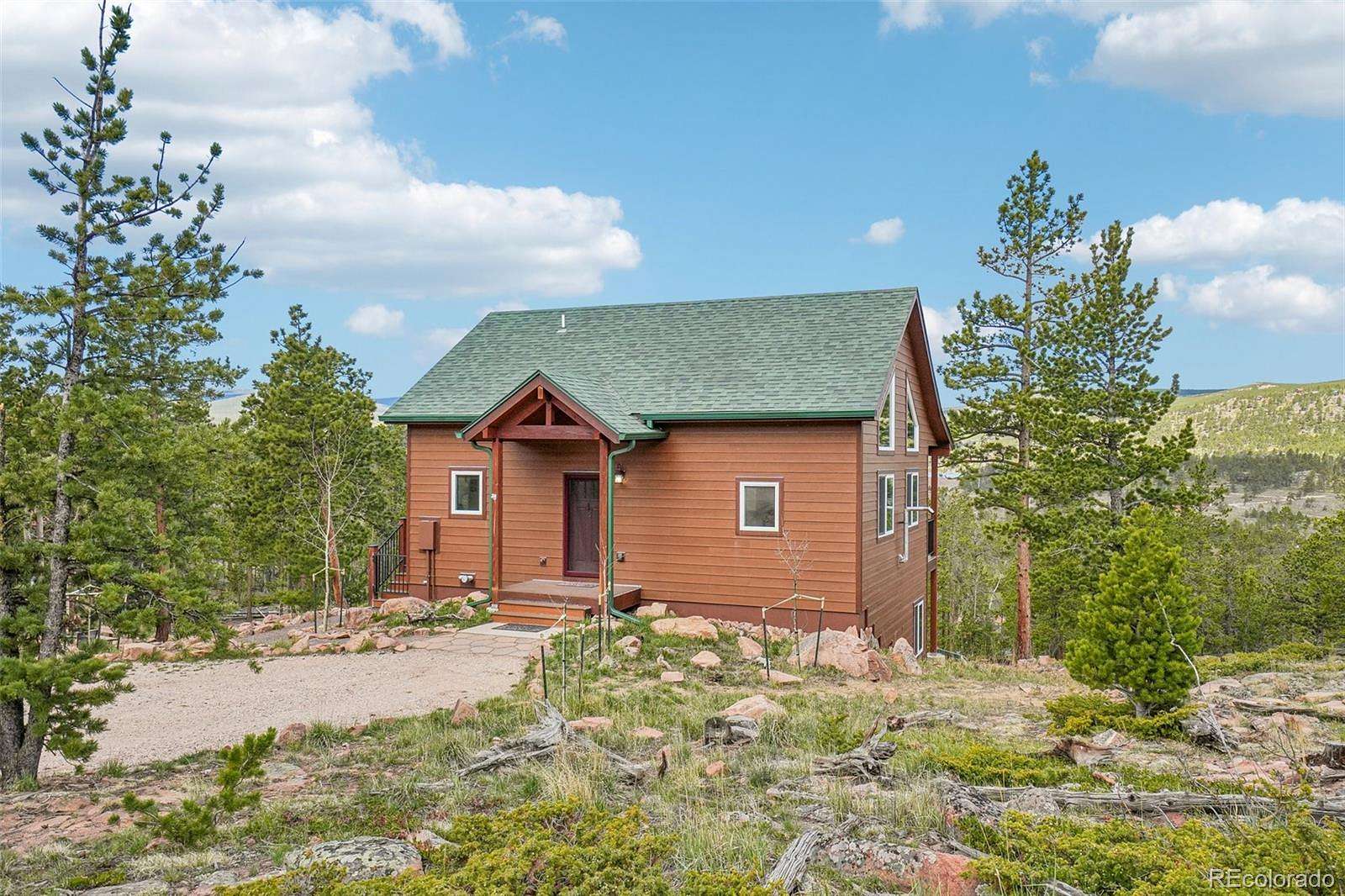 1.55 Acres of Land with Home for Sale in Red Feather Lakes, Colorado